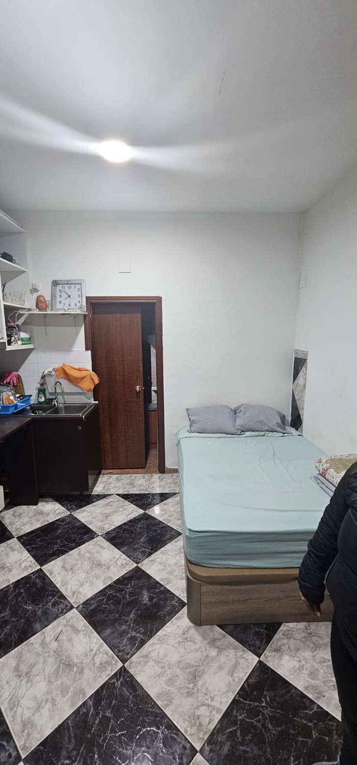 Piso y local en venta