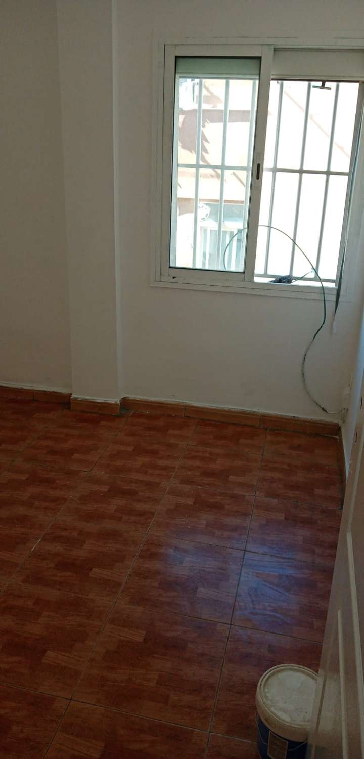 Piso y local en venta